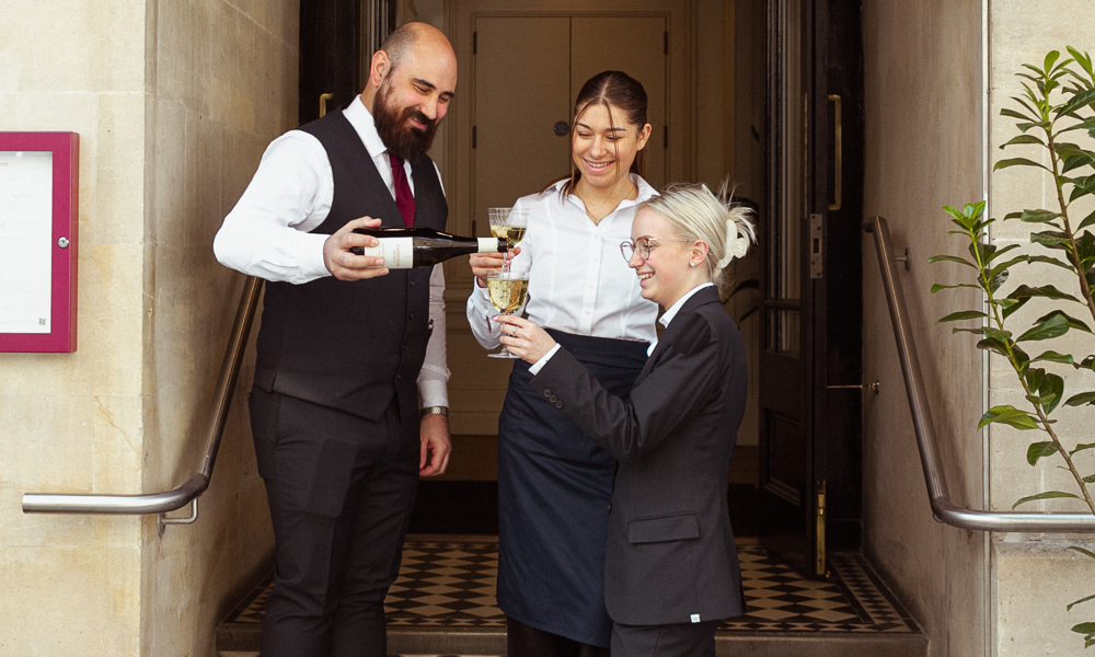 Emberwood Team raising a toast